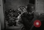 Image of pile of emaciated corpses Germany, 1945, second 21 stock footage video 65675073907