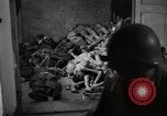 Image of pile of emaciated corpses Germany, 1945, second 22 stock footage video 65675073907