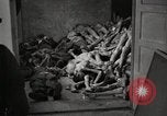 Image of pile of emaciated corpses Germany, 1945, second 24 stock footage video 65675073907