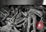 Image of pile of emaciated corpses Germany, 1945, second 61 stock footage video 65675073907