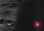 Image of unburied bodies of victims Germany, 1945, second 9 stock footage video 65675073912