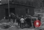 Image of unburied bodies of victims Germany, 1945, second 62 stock footage video 65675073912