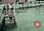 Image touristes nageant Carinthie Autriche, 1937, de la seconde 26 séquences d'archives historiques vidéo 65675074084