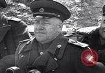 Image of Soviet Marshal Georgy Zhukov and staff under camouflage netting at the front Berlin Germany, 1945, second 13 stock footage video 65675074095