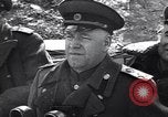 Image of Soviet Marshal Georgy Zhukov and staff under camouflage netting at the front Berlin Germany, 1945, second 15 stock footage video 65675074095