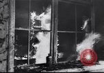 Image of Soviet soldier with  PPSh sub machine gun pulls German soldier from cellar Berlin Germany, 1945, second 6 stock footage video 65675074103
