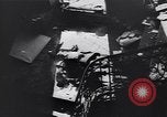 Image of Soviet soldier with  PPSh sub machine gun pulls German soldier from cellar Berlin Germany, 1945, second 23 stock footage video 65675074103