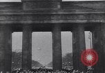 Image of Soviet soldier with  PPSh sub machine gun pulls German soldier from cellar Berlin Germany, 1945, second 38 stock footage video 65675074103