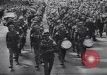 Image of Soviet soldier with  PPSh sub machine gun pulls German soldier from cellar Berlin Germany, 1945, second 44 stock footage video 65675074103