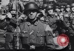 Image of Soviet soldier with  PPSh sub machine gun pulls German soldier from cellar Berlin Germany, 1945, second 47 stock footage video 65675074103
