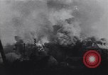 Image of Soviet soldier with  PPSh sub machine gun pulls German soldier from cellar Berlin Germany, 1945, second 61 stock footage video 65675074103