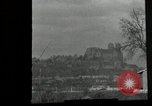 Standbild US Artillerie Beschuss St Stephan's Cathedral Vieux-Brisach Deutschland, 1945, aus Sekunde 56 historischem Filmmaterial Videoclip 65675074265