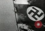 Standbild Adolf Hitler am frühen Sitzungen im Aufstieg zur Macht Deutschland, 1929, aus Sekunde 55 historischem Filmmaterial Videoclip 65675074291
