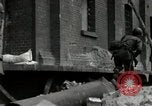 Image of U.S. Army patrol moves carefully through ruins of German City Ludwigshafen Germany, 1945, second 9 stock footage video 65675074328