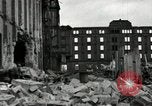 Image of U.S. Army patrol moves carefully through ruins of German City Ludwigshafen Germany, 1945, second 29 stock footage video 65675074328