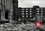 Image of U.S. Army patrol moves carefully through ruins of German City Ludwigshafen Germany, 1945, second 31 stock footage video 65675074328
