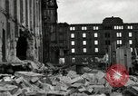 Image of U.S. Army patrol moves carefully through ruins of German City Ludwigshafen Germany, 1945, second 34 stock footage video 65675074328