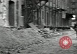 Image of U.S. Army patrol moves carefully through ruins of German City Ludwigshafen Germany, 1945, second 44 stock footage video 65675074328