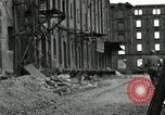 Image of U.S. Army patrol moves carefully through ruins of German City Ludwigshafen Germany, 1945, second 52 stock footage video 65675074328