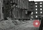 Image of U.S. Army patrol moves carefully through ruins of German City Ludwigshafen Germany, 1945, second 54 stock footage video 65675074328