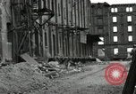 Image of U.S. Army patrol moves carefully through ruins of German City Ludwigshafen Germany, 1945, second 55 stock footage video 65675074328