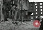 Image of U.S. Army patrol moves carefully through ruins of German City Ludwigshafen Germany, 1945, second 60 stock footage video 65675074328