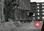 Image of U.S. Army patrol moves carefully through ruins of German City Ludwigshafen Germany, 1945, second 62 stock footage video 65675074328