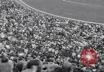 Image of crowded stadium Rome Italy, 1960, second 16 stock footage video 65675074349