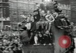 Image of English crowd celebrating V-E Day in Europe end of World War 2 London England United Kingdom, 1945, second 15 stock footage video 65675074354