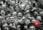 Image of English crowd celebrating V-E Day in Europe end of World War 2 London England United Kingdom, 1945, second 28 stock footage video 65675074354