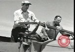 Image of civilians of depot Georgia United States USA, 1951, second 52 stock footage video 65675074378