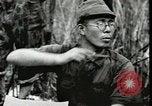 Standbild Japanese-American Marines New Britain Papua Neu Guinea, 1944, aus Sekunde 35 historischem Filmmaterial Videoclip 65675074391