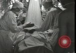 Immagine di Feriti soldati americani La Nuova Bretagna Papua Nuova Guinea, 1944, secondo 26 filmato di repertorio 65675074392
