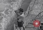 Standbild australischen Überlebenden Pazifik, 1944, aus Sekunde 15 historischem Filmmaterial Videoclip 65675074409