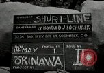 Image of explosions on hill Okinawa Ryukyu Islands, 1945, second 5 stock footage video 65675074417