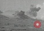 Image of explosions on hill Okinawa Ryukyu Islands, 1945, second 12 stock footage video 65675074417