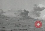 Image of explosions on hill Okinawa Ryukyu Islands, 1945, second 13 stock footage video 65675074417