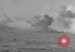 Image of explosions on hill Okinawa Ryukyu Islands, 1945, second 14 stock footage video 65675074417