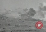 Image of explosions on hill Okinawa Ryukyu Islands, 1945, second 15 stock footage video 65675074417