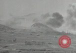 Image of explosions on hill Okinawa Ryukyu Islands, 1945, second 16 stock footage video 65675074417