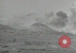 Image of explosions on hill Okinawa Ryukyu Islands, 1945, second 17 stock footage video 65675074417