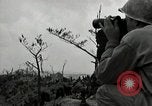 Image of explosions on hill Okinawa Ryukyu Islands, 1945, second 29 stock footage video 65675074417