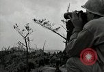 Image of explosions on hill Okinawa Ryukyu Islands, 1945, second 30 stock footage video 65675074417
