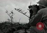 Image of explosions on hill Okinawa Ryukyu Islands, 1945, second 35 stock footage video 65675074417