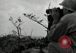 Image of explosions on hill Okinawa Ryukyu Islands, 1945, second 36 stock footage video 65675074417