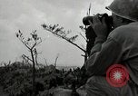 Image of explosions on hill Okinawa Ryukyu Islands, 1945, second 37 stock footage video 65675074417