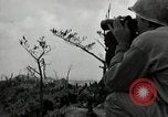Image of explosions on hill Okinawa Ryukyu Islands, 1945, second 38 stock footage video 65675074417