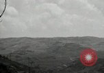 Image of explosions on hill Okinawa Ryukyu Islands, 1945, second 39 stock footage video 65675074417