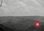 Image of explosions on hill Okinawa Ryukyu Islands, 1945, second 41 stock footage video 65675074417
