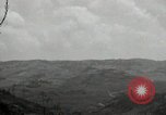Image of explosions on hill Okinawa Ryukyu Islands, 1945, second 42 stock footage video 65675074417